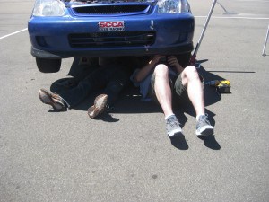 Greg and Kai, using the Civic as a sun shade.